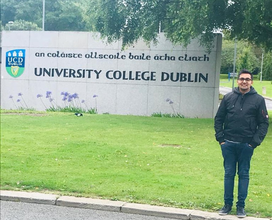 “Image of Kiran standing outside UCD”